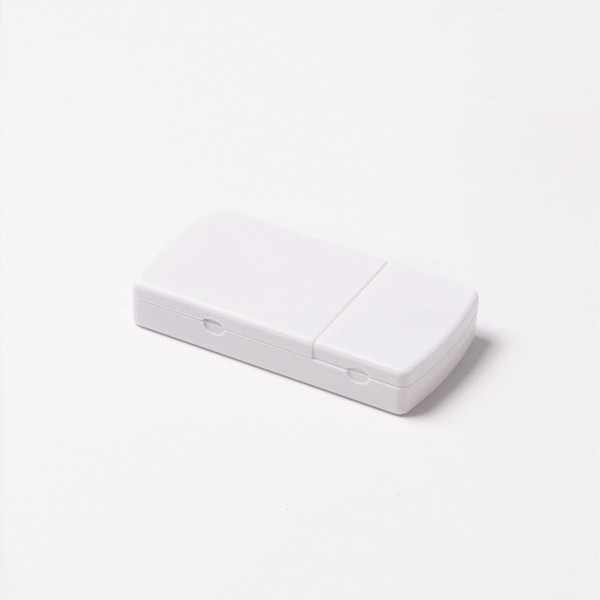 Personalised pill box with tablet cutter in plastic with two sections