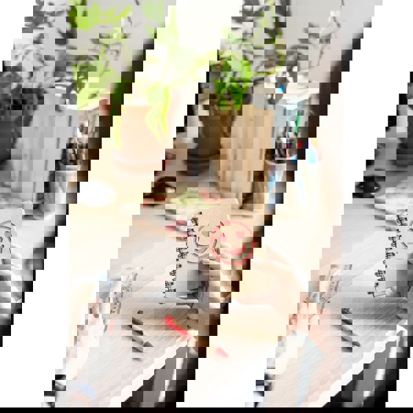 Notizbuch ca. B7 "lächelndes Gesicht" mit Kugelschreiber | Dylan - schwarz