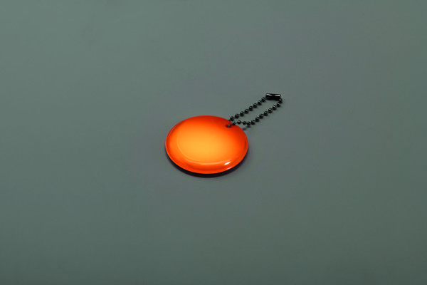 Round reflective keyring Grin - Neon Orange