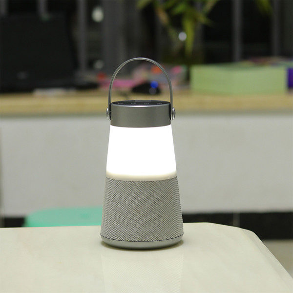Portable LED lamp with speaker