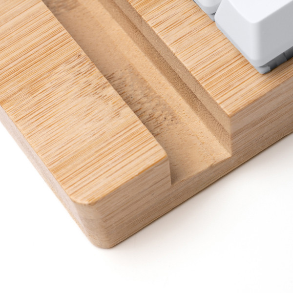 Personalised bamboo smartphone stand with anti-stress buttons
