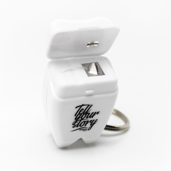 Toothy keychain with dental floss