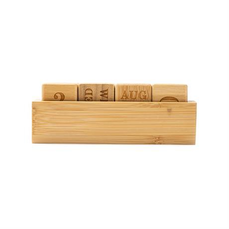 Personalised perpetual desk calendar in bamboo with four engraved blocks